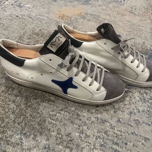 White and Gray Sneakers with Blue Accent